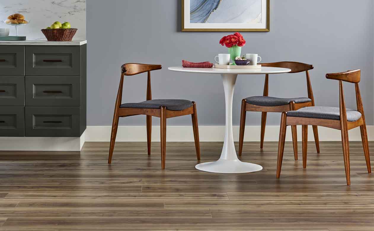 luxury vinyl plank flooring in modern kitchen with white kitchen table